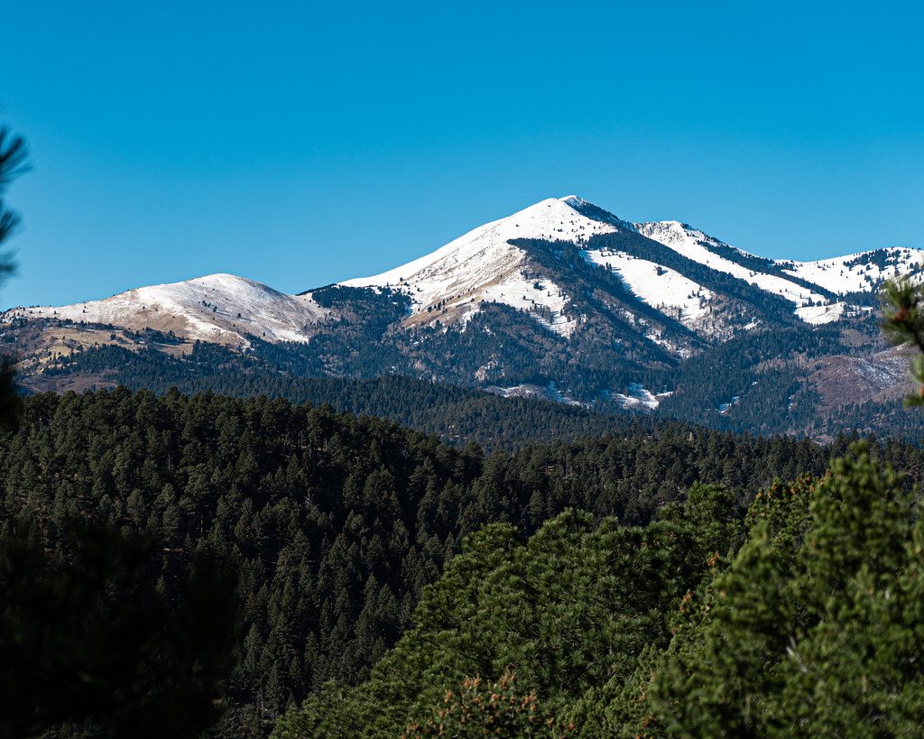 Snow dusted summit of Sierra Blanca peak